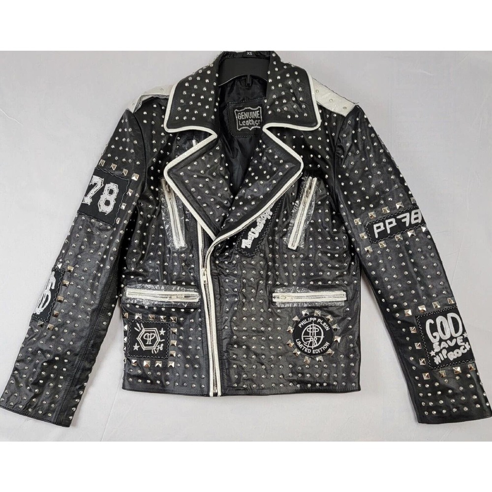 New studded Genuine Leather I wear a ladies S. fits more like Med-Large. So cool